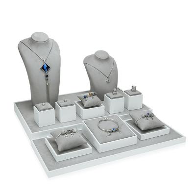 China New Arrival Packaging High Quality Jewelry Display Set Made Of Painted MDF And Gray Fabric Showcase for sale