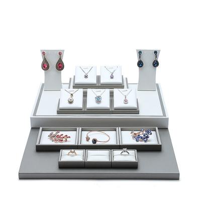 China High Quality Jewelry Packaging New Arrival PU Leatherette Jewelry Display Showcase Set With MDF For Necklace Earring Bracelet And Rings for sale