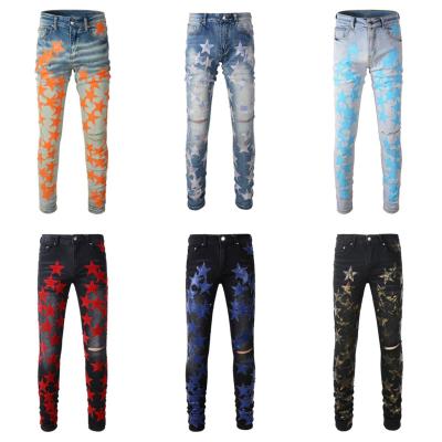 China Dropshipping QUICK DRY Ripped Distressed Leather Designer Mens Denim Star Patch Jeans for sale