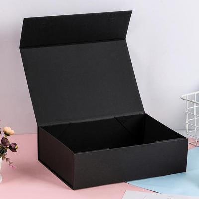 China Custom Logo Design Recyclable Luxury Black Paper Cardboard Foldable Magnetic Gift Box Handmade Cosmetic Box for sale