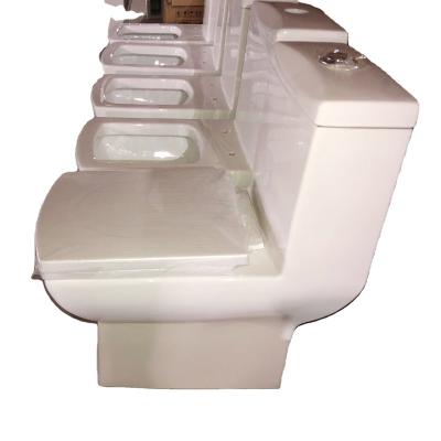 China Double-flush Pakistan 100MM Rough-in price cheap toilet tie gravity wash down one-piece flush square ceramic toilet for sale