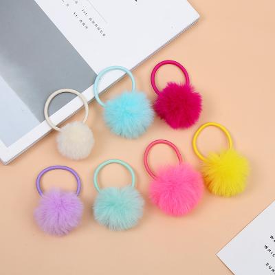 China Kids Size Hair Flip Ponytail Holder Hair Accessories Cute Soft Cute Mini Soft Pompom Ball Hair Ties Elastic for sale