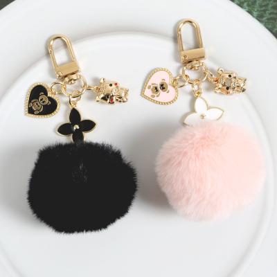 China Custom Wholesale Casual Cute Heart Bear Blast Accessories Bag Fluffy Keychains Key Chain for sale