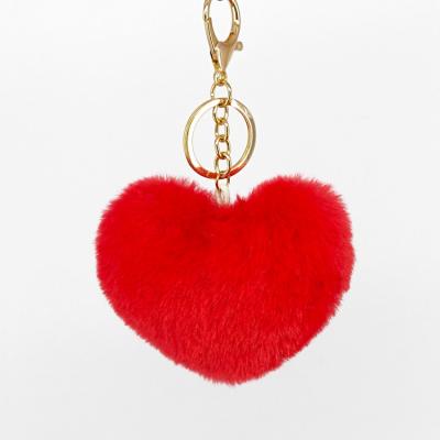 China Personalized Casual Fluffy Pompom Heart Key Chain For Bag Pendant Key Chain for sale