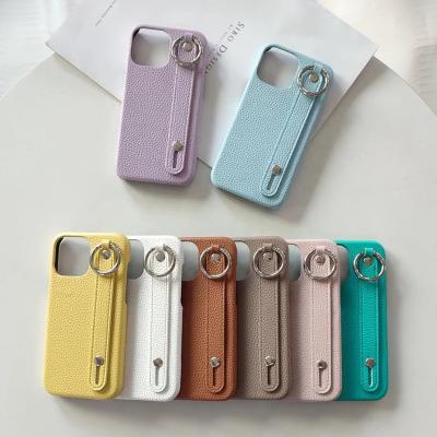 China New Litchi Pattern Wrist Chain Leather Phone Case Shockproof For iPhone 11 12 Pro Max Wrist Ring Bracket PC Back Cover Of 13 14 for sale