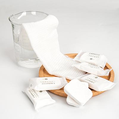 China Compressed Disposable Viscous Nonwovens compressed single pack cotton toalha de rosto universal napkin aviation hotel travel for sale