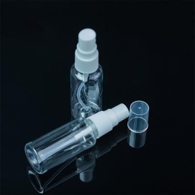 China Empty Trigger Spout Re-usable Mini Bottle Essential Oil Perfume Bottle Packaging Transparent Plastic Spray Cosmetic Bottle for sale