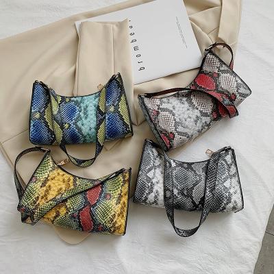 China Others Factory Women's Snake Pattern 2022 Cheap Purses Ladies Purse Under Bag Small For Young Lady for sale