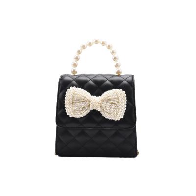 China 2021 Fashion Pearl Handle Bow Small Purse Girsl Cross - Body Bag Chain Women Purses Leather Fashionable Handbags for sale