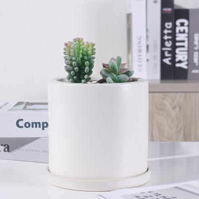 China Stocked end-price white modern Nordic planter round shape ceramic planter for indoor and outdoor for sale