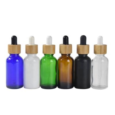 China Unique Luxury Colorful Bamboo Personal Care 1Oz 30Ml Dropper Essential Oil Bottle for sale