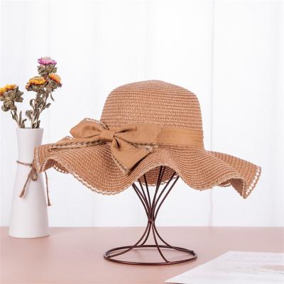 China Lovely Breathable Foldable Summer Straw Bowknot Hats Beach Sun Hats For Women Ladies Fishing Hat Woven Sun Hat for sale