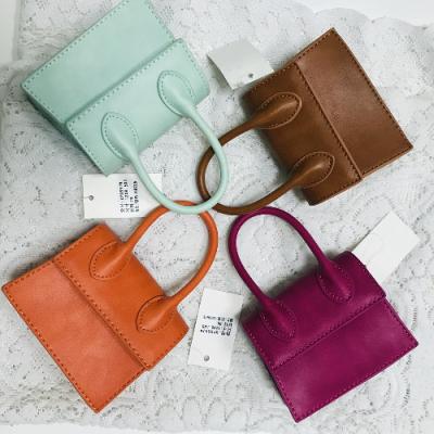 China 2022 high quality new mini purse high quality mini fashion cross - body bags vegan leather handbags small for kids and women for sale