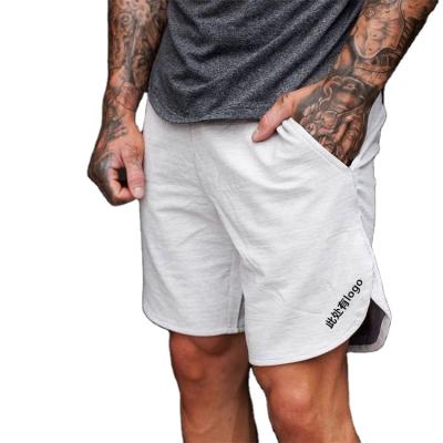 China Anti-wrinkle summer hot sports and casual fitness shorts men's loose breathable running training plus size men's shorts for sale