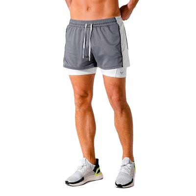 China Anti-wrinkle men's gym shorts plus size fitness shorts Quick-drying Double-layer High-elastic basketball sports men shorts for sale