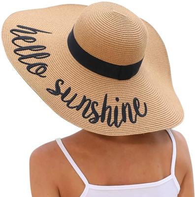 China Striped Drop Shipping UPF 50+ Women Foldable Roll Up Beach Hat 5.5 Inch Big Bowknot Floppy Disc Straw Sun Hat for sale