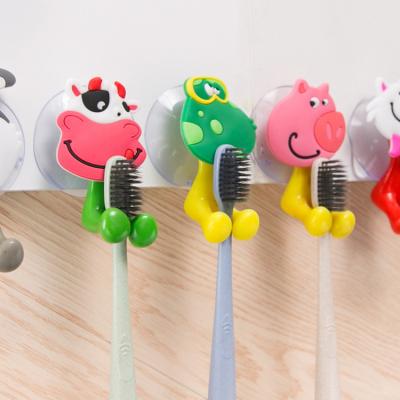 China Beautiful Viable Popular Creative Design Animal Colorful Storage Bathroom Toothbrush Wall Mounted Holder for sale