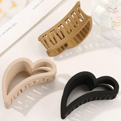 China Newest Love Hair Claw Clips Hollow Matte Large Size 11cm Shark Clip Plastic Hair Claws for sale