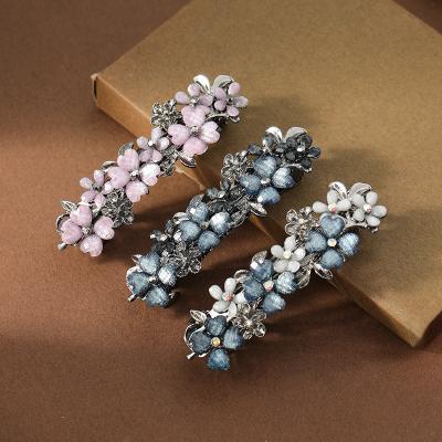 China Beautiful 2021 High Quality and Fast Delivery Headdress Crystal Spring Hair Clips Rhinestone Metal Alloy Flower Spring Hair Clips For Female for sale