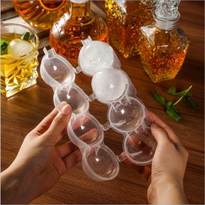 China New 4 Hole Ice Tray Set 4 Ice Hole Viable Hockey Whiskey Round Ice Tray Mold for sale