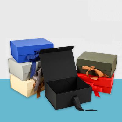 China Reused Materials Factory Logo Rigid Paper Foldable Custom Made Matte Black Luxury Magnetic Gift Boxes With Ribbon For Packaging for sale