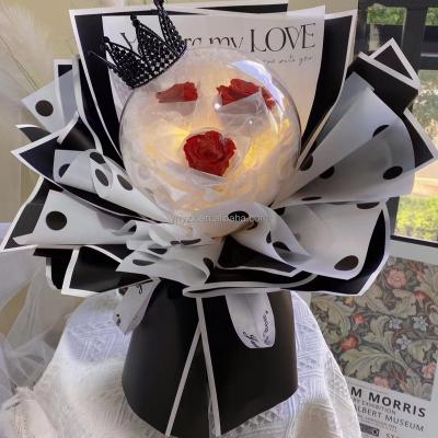 China Creative Diy Balloon Flower Gift Set Decorative Reusable Glowing Led Clear Round Rose Bouquet Bobo Ball 50*50*30 Travel Balloons for sale