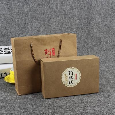 China Recyclable Hand Length Custom Order Accept Gift Bag Brown Color Craft Paper Shopping Clothing Packaging Handbag Customized Your Own Logo for sale