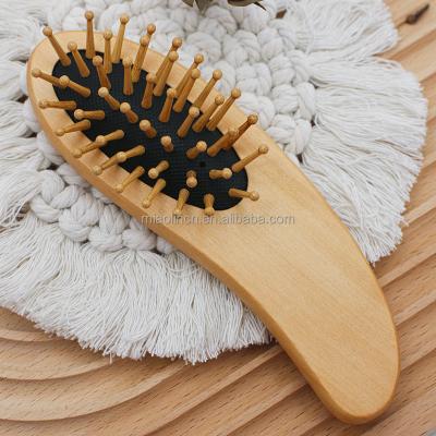 China For Home Use New Mango Shape Portable Mini Travel Bamboo Wooden Air Cushion Hair Brush Children Comb Hotel Comb Healthy Gift Item for sale