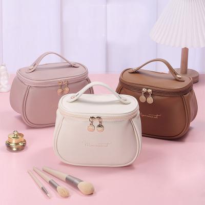 China Large Capacity PU Makeup Bag Travel Cosmetic Bag Large Capacity Storage Makeup Bag Multi-Function Portable Waterproof Toiletries Storage for sale