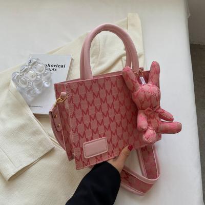 China Large Capacity Alphabet Bag Shape Portable Tote Bag Cute Rabbit One Shoulder Cross - Body Bag for sale