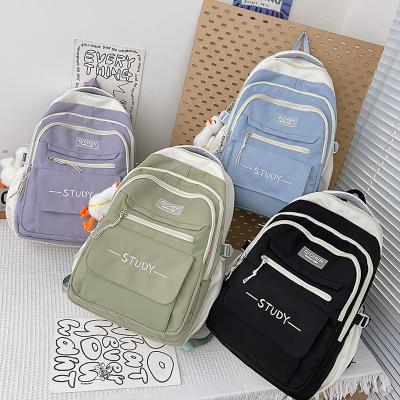 China New fashion 2023 trend simple waterproof backpack female simple leisure large capacity school bag student backpack for sale