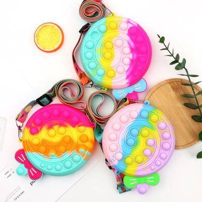 China Waterproof Mini Kids Coin Purses 2022 Little Girls Purses And Handbags Fashion Push Bubble Bubble Purses For Children for sale