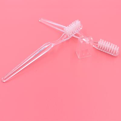 China Cheap Foldable With Cover 26 Tufts Bristles PS Or PP Toothbrush for sale