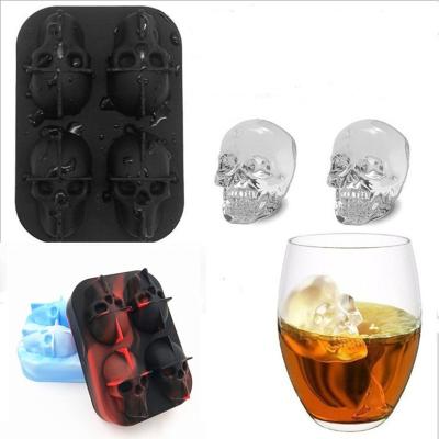 China Food Grade Silicone Halloween 3d Grids 4 Silicone Ice Cube Tray With Lids Skull Shape Silicone Ice Stocked Grid for sale