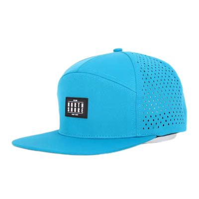 China Custom Front Flat Peak Snapback Mid Profile 7 Panel Snapback Hat for sale