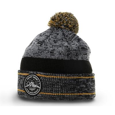 China Caloroso Inverno Homens Pom Pom Beanie Chapéus Beanie Heathered Com Rubber Badge Logotipo à venda