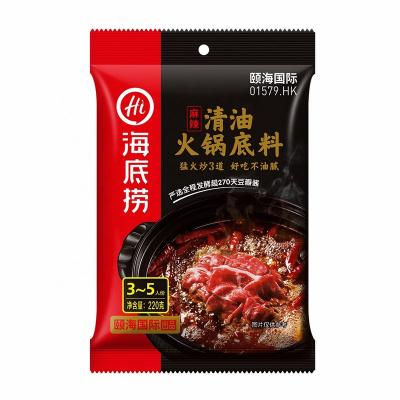 China Put it in the cook Wholesale Sichuan sea bottom fish oil flavor authentic spicy hot pot seasoning bottom 220g per bag for sale