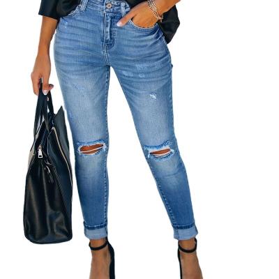 China Sustainable Womens Clothing Slim Hole Pants Pencil Pants High Rise Jeans Womens Long Ripped Jeans for sale