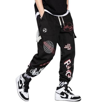 China Breathable 2022 Letters Graffiti Printed Men's Loose Straight Couples Student Jumpsuits Men's Drawstring Casual Trousers for sale