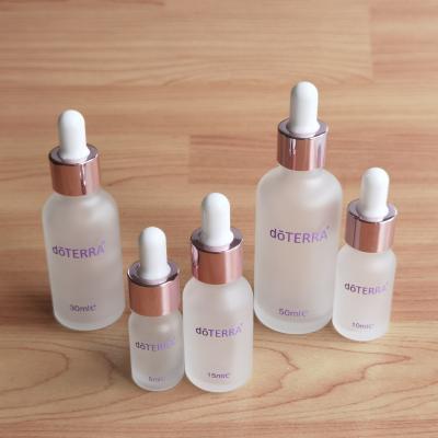 China Rose Gold Cover Glass Grease Essential Oil Essential Oil Bottle Drops Empty Essence Slot Bottle Wholesale for sale