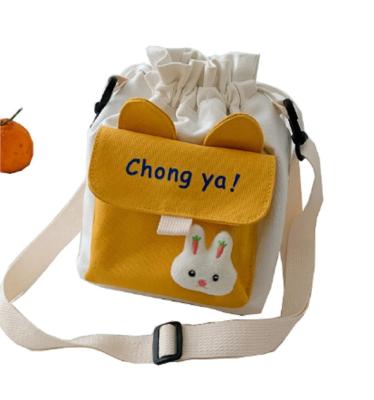 China 2020 hot selling canvas bucket shape drawstring bag shoulder backpacks bags for adults or kids for sale