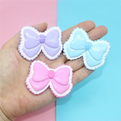 China China Factory Hot Sale Resin Bowknot Opens Craft Fashion Bow Plastic Cabochon for sale