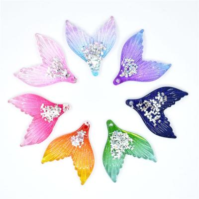 China New Arrival Fancy Craft Artificial Props Sparkle Resin Cabochons Mermaid Tail Craft Resin Crafts for sale