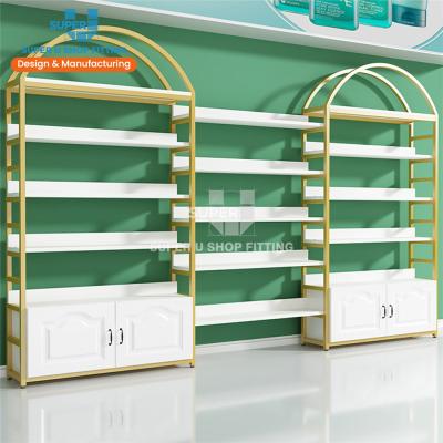 China Fashion Wall Display Shelf Cosmetics Product Cabinet Beauty Store Showcases Cosmetic Supply Display Rack Shelf Holder for sale