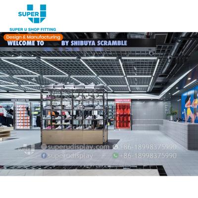 China New Sporting POS Store Customized Display Systems Modern Sports Shop Showroom Interior Design Creative Ideas Sport Room Display Store Fittings Factory Supply article display rack exhibition for sale