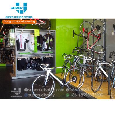 China Guangzhou MDF supplier bicycle shop rack bicycle retail store display decoration unique design for sale