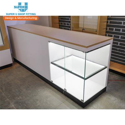 China Modern White Adjustable (Height) Reception Electronic Display Furniture Shop Display Fixtures Designs Shop Table Cashier Desk Checkout Counter for sale