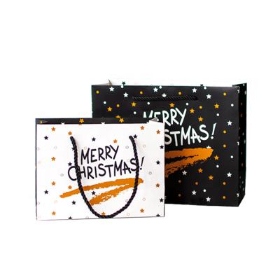 China Recycled Materials Hot Sale Christmas Gift Packaging Eco Paper Bag Christmas Shopping Bags for sale