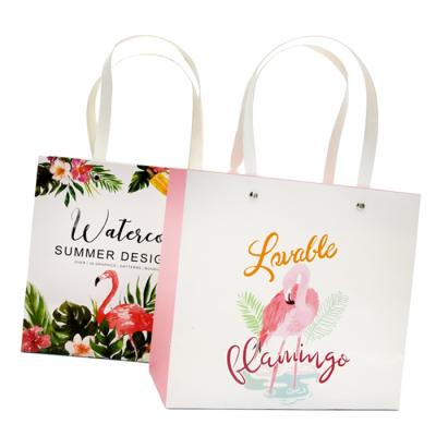 China Recycled Materials Wholesale Customized Printing Shopping Bags Packaging Labels Clothing Paper Bag for sale