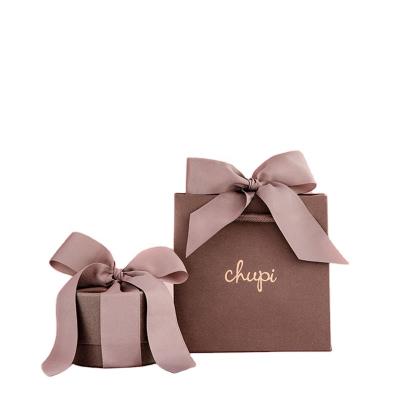 China Wholesale Cheap Recyclable Luxury Exquisite Ribbon Handle Jewelry Wedding Gift Bag for sale